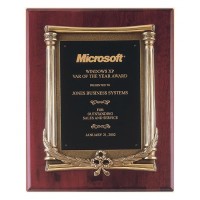 Rosewood piano finish plaque with cast frame